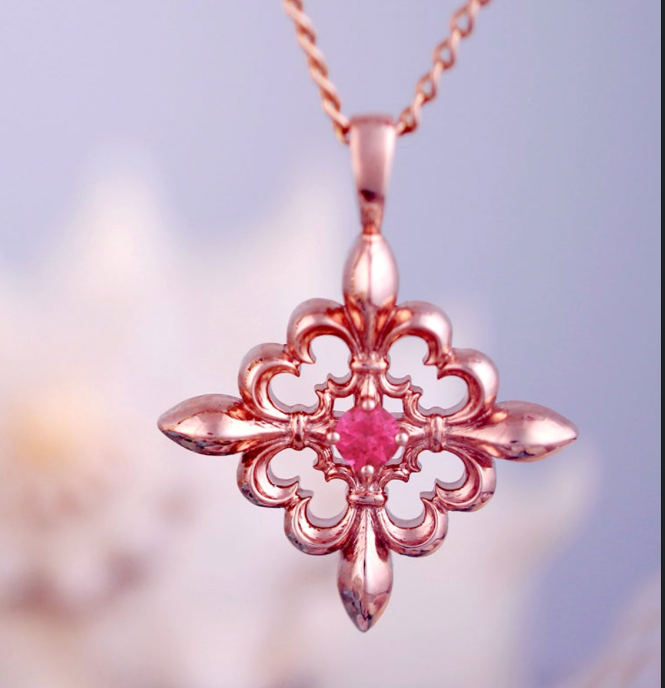 fleurdelis pendant in Rose gold wih ruby