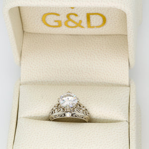 gold moissanite engagement ring in G&D Unique Designs jewelry gift box